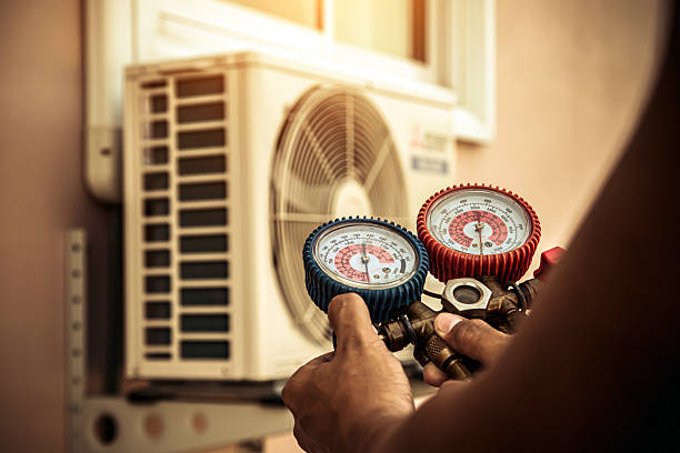 Professional Air Conditioning Service technician working in Milford, PA
